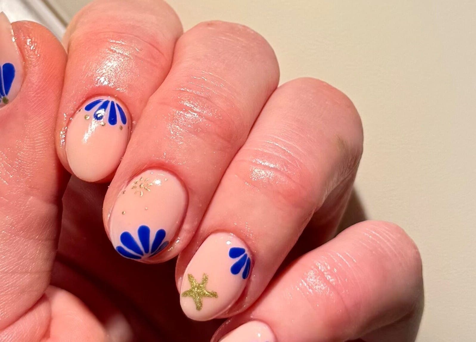 Elegant blue and gold nail art at Nails By Valente, Tranent, Scotland, GB.