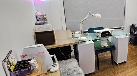 Cozy nail care station at Inner Doll Beauty, Melbourne, Victoria, AU, featuring a sleek desk and stylish decor.