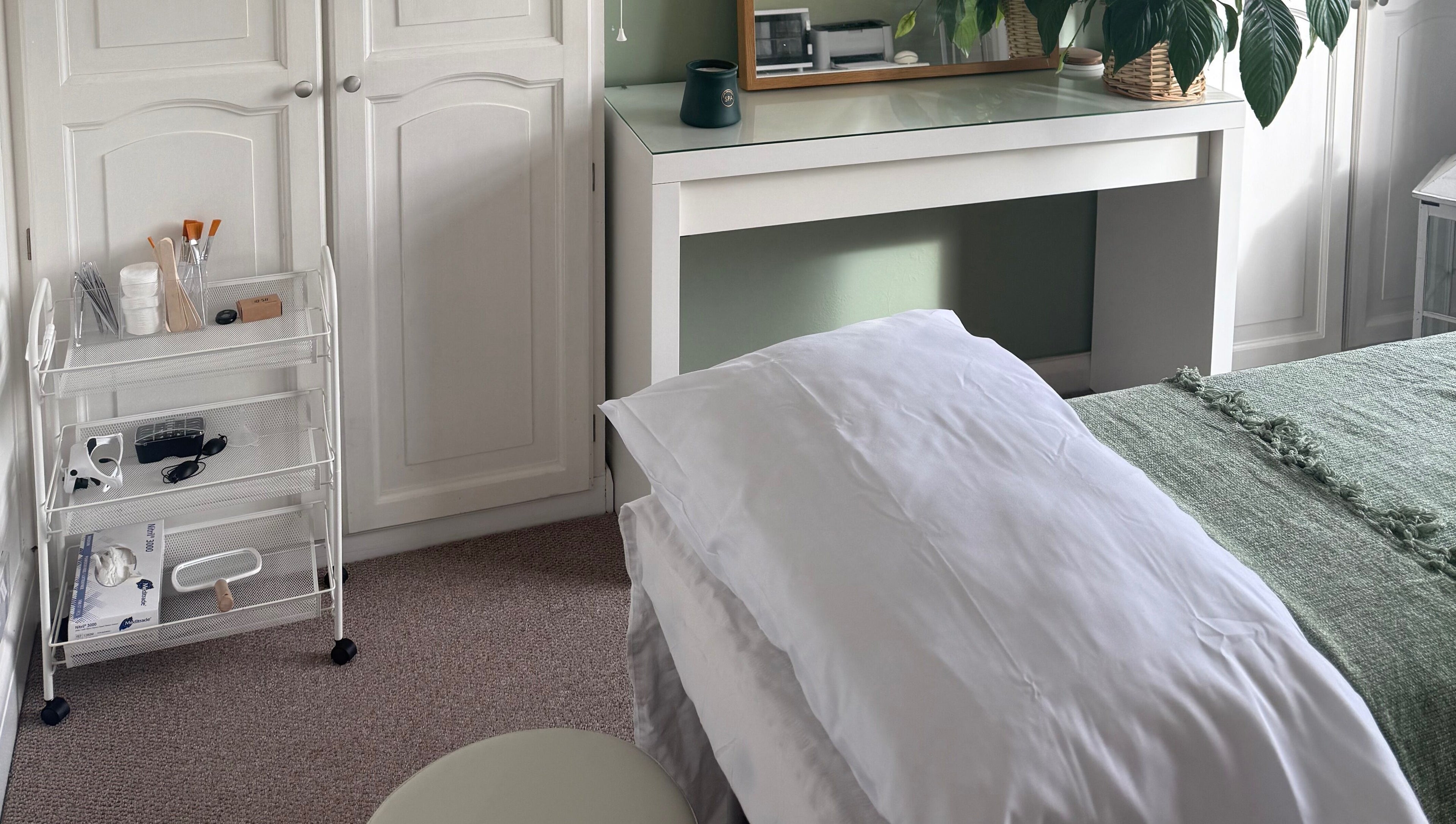 Calming treatment room at Jessica's at Chichester, featuring a bed and soothing decor in Chichester, England, GB.
