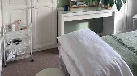 Calming treatment room at Jessica's at Chichester, featuring a bed and soothing decor in Chichester, England, GB.