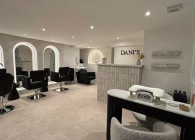 Chic salon interior at Beauty by Leah, Cefn-coed-y-cymmer, Wales, GB featuring modern styling stations.