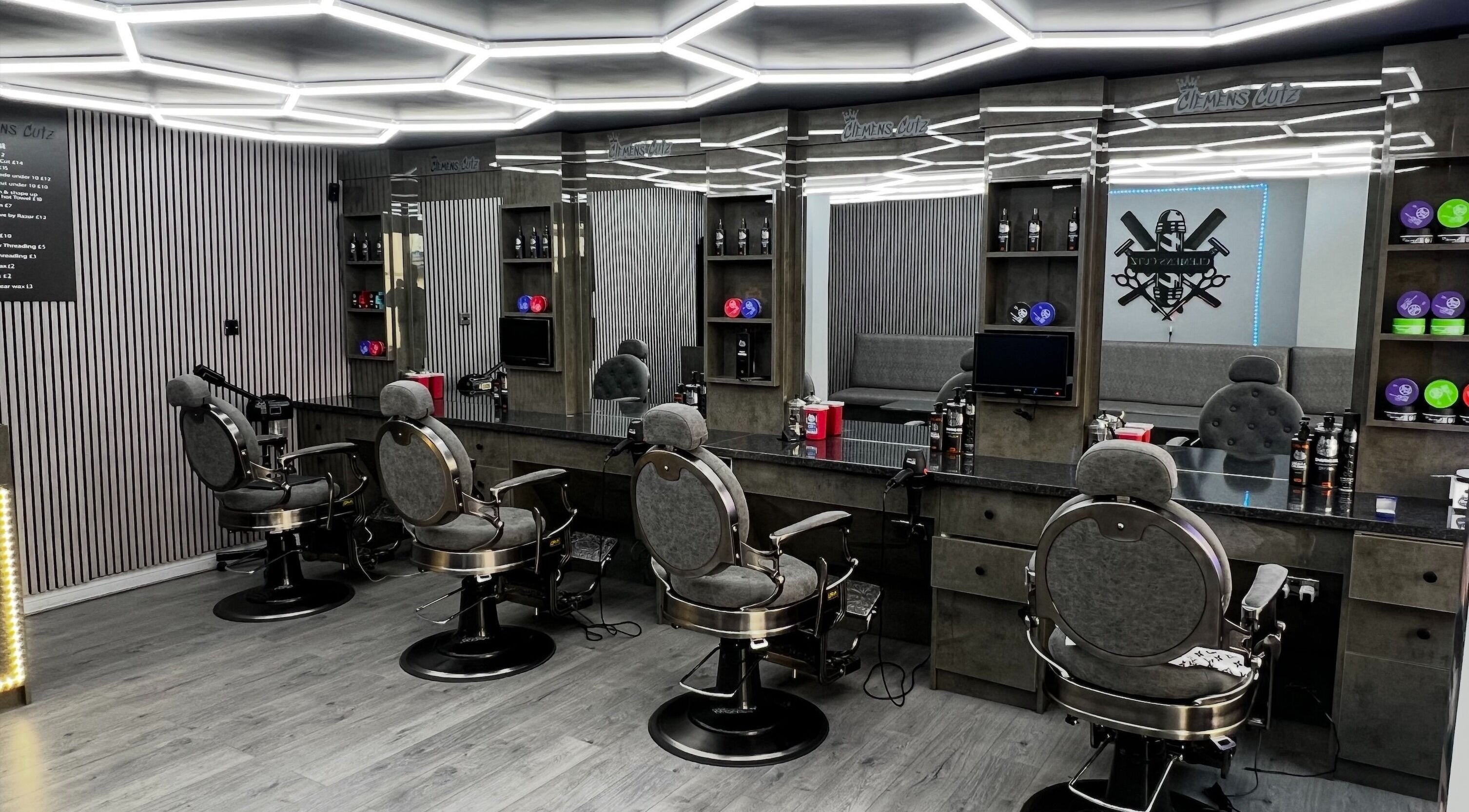 Chic interior of Clemens Cutz in Royal Leamington Spa, England, with stylish barber chairs and modern decor.