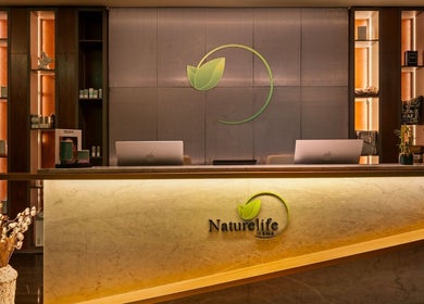 Reception area at Naturelife Spa Premium, Dubai, Dubai, AE, featuring a modern, elegant design.