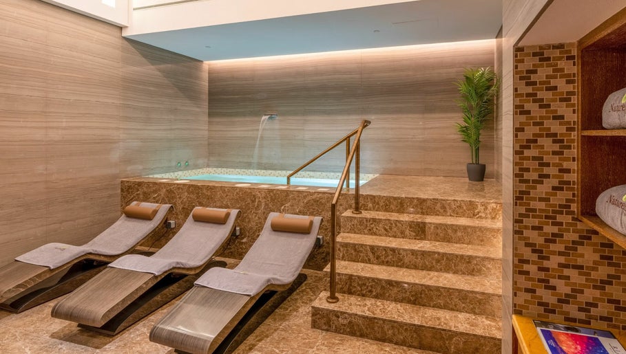 Relaxing loungers and spa pool at Naturelife Spa Marina Abu Dhabi, Abu Dhabi, Abu Dhabi, AE.