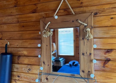 Wooden mirror reflecting serene room at Listening Fields Holistic Massage, Dublin City Centre, Dublin, County Dublin, IE.