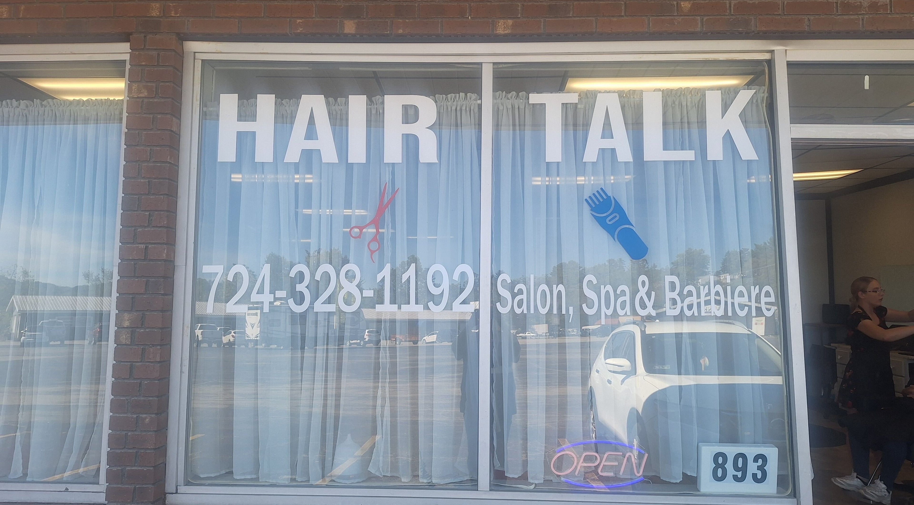 Hair Talk entrance with large windows and signage in Washington, Pennsylvania, US.