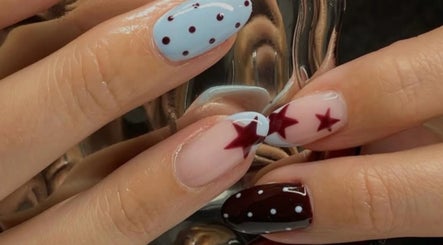 Creative nail art with stars and polka dots at June Studios in Edinburgh, Scotland, GB.