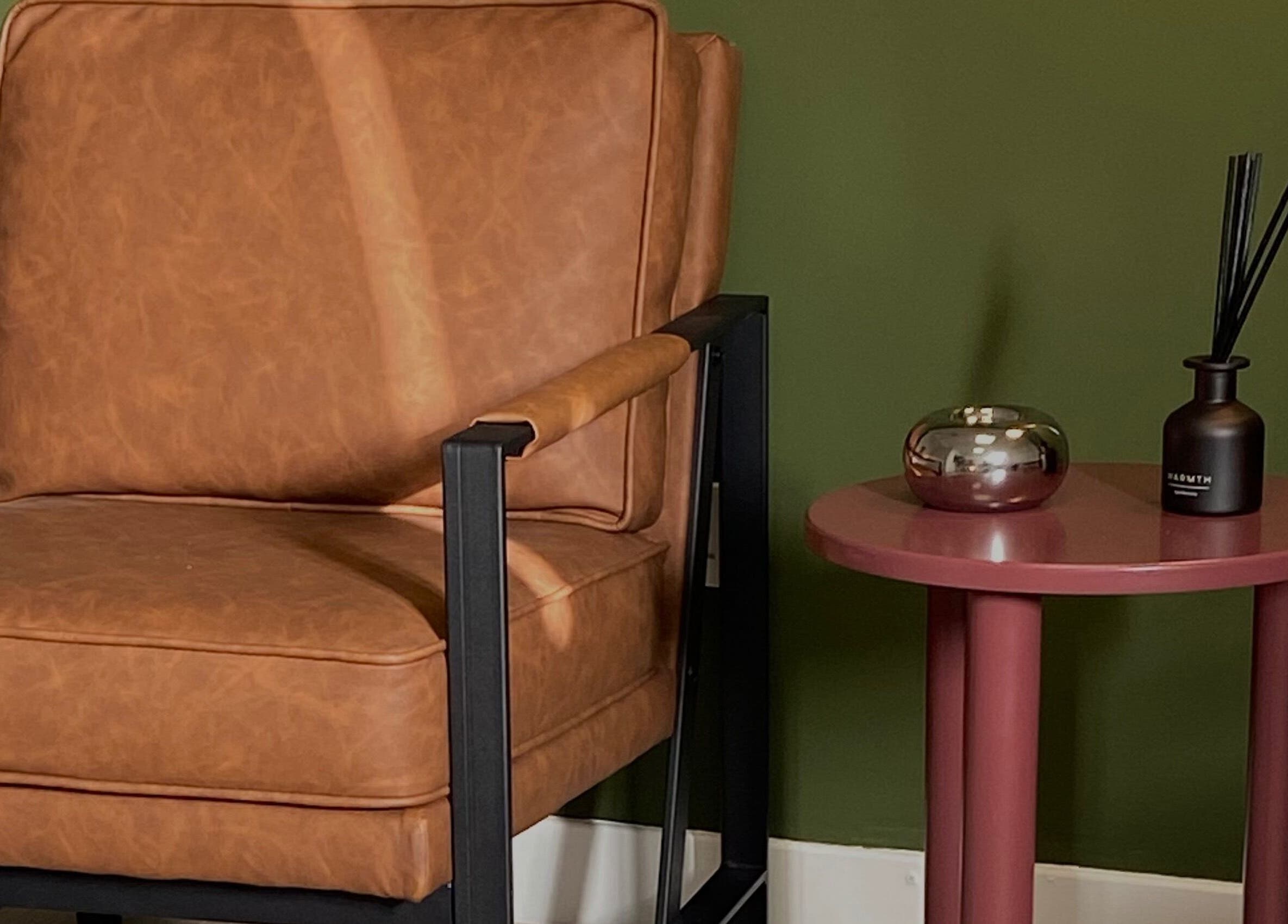 Stylish brown chair and side table setup at June Studios, Edinburgh, Scotland, GB.