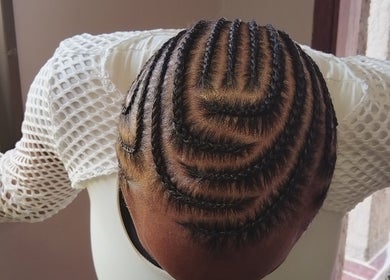 Intricate braided hairstyle at TGT hair, Kempton Park, Gauteng, ZA.