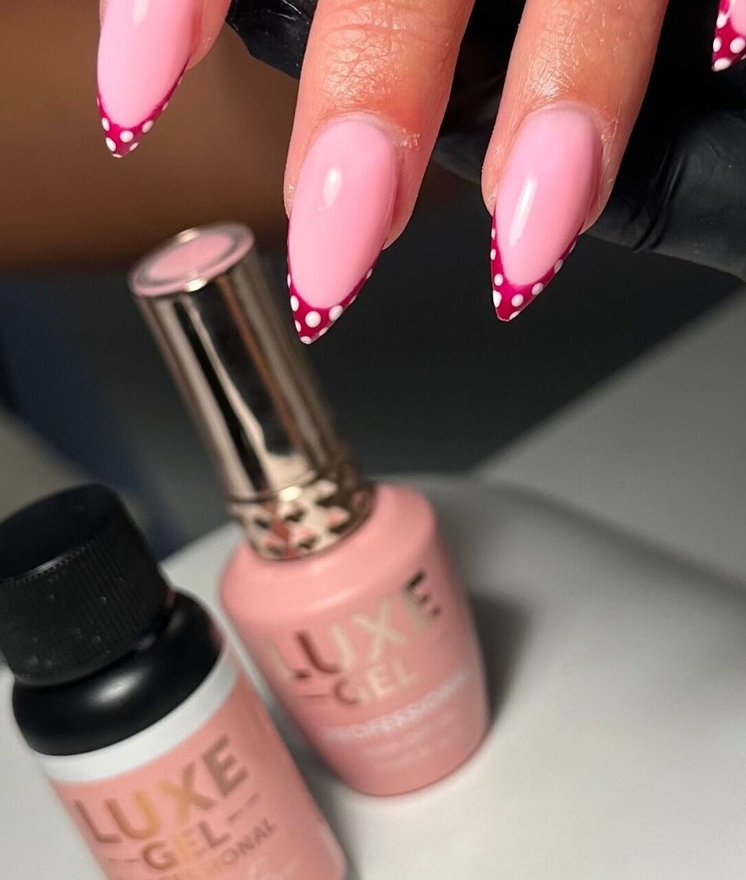 Elegant pink polka dot nails at Classyclaws, Dublin, County Dublin, IE, showcasing class and style.