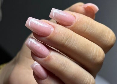 Elegant pink manicure at Aesthetics_by_marta_ in Bragança, Bragança, PT.