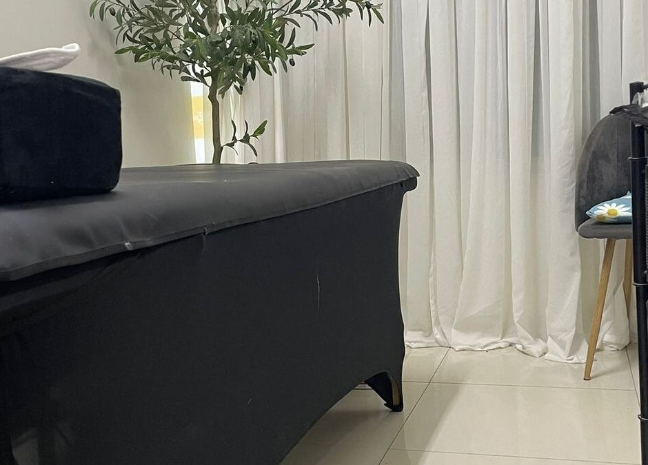 Relaxing treatment room at Donna Marie Skin Pharm, Old Harbour, St. Catherine Parish, JM, with massage table.