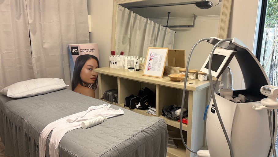 MedShape spa room in Peregian Springs, Queensland, AU with treatment bed, beauty equipment, and products.