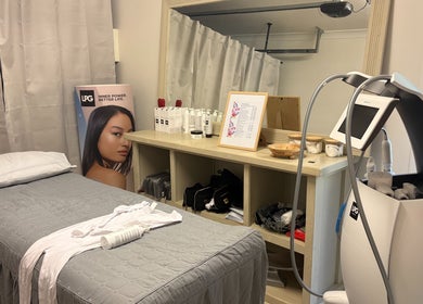 MedShape spa room in Peregian Springs, Queensland, AU with treatment bed, beauty equipment, and products.