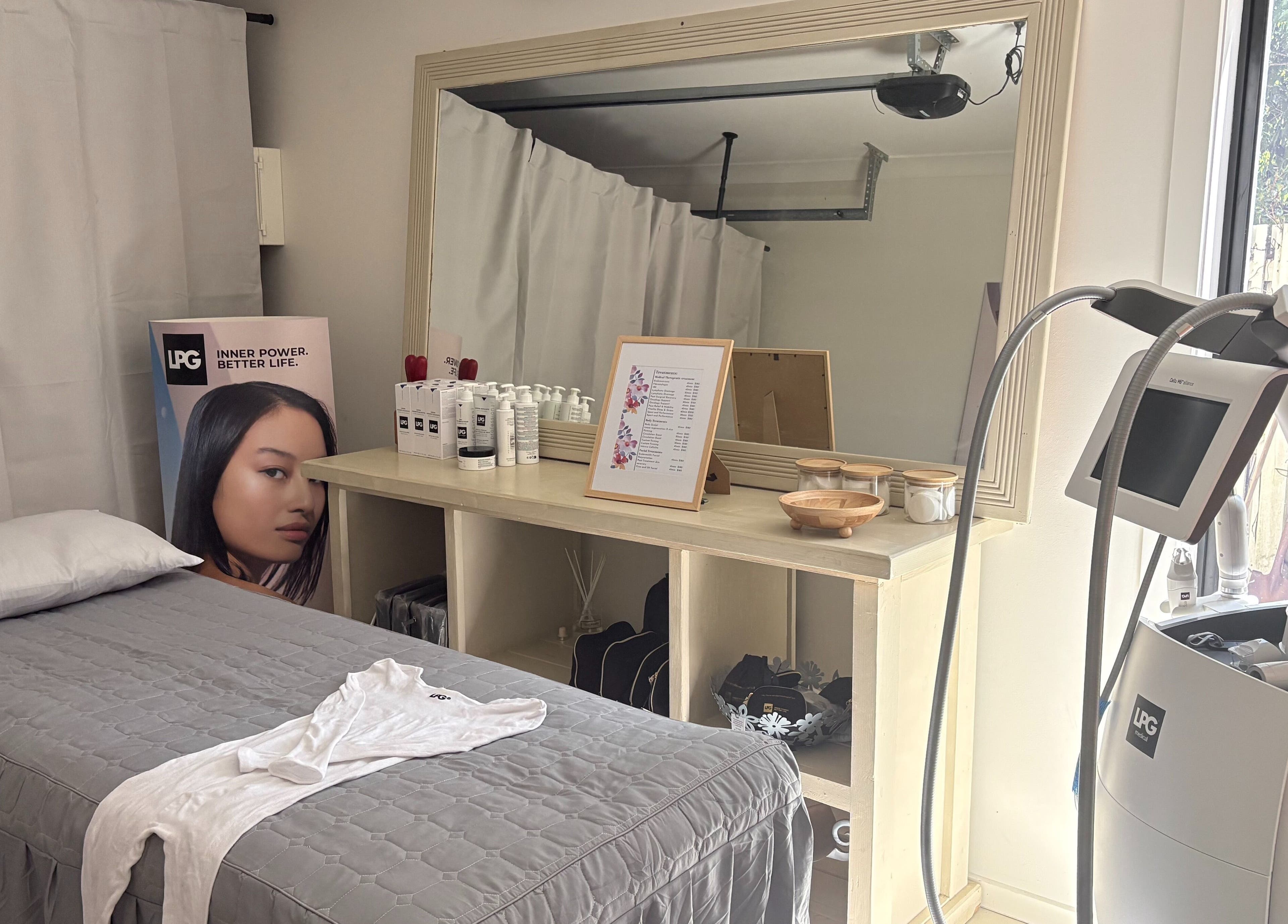 Luxurious beauty treatment room at MedShape, Peregian Springs, Queensland, AU with spa bed and modern equipment.