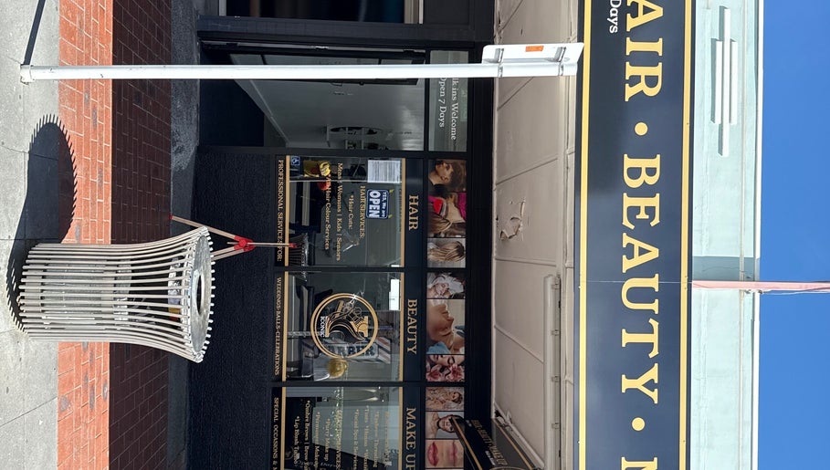 Entrance of Iconic Hair Beauty and Makeup in Hastings, Hawke's Bay Region, NZ, showcasing elegant signage.