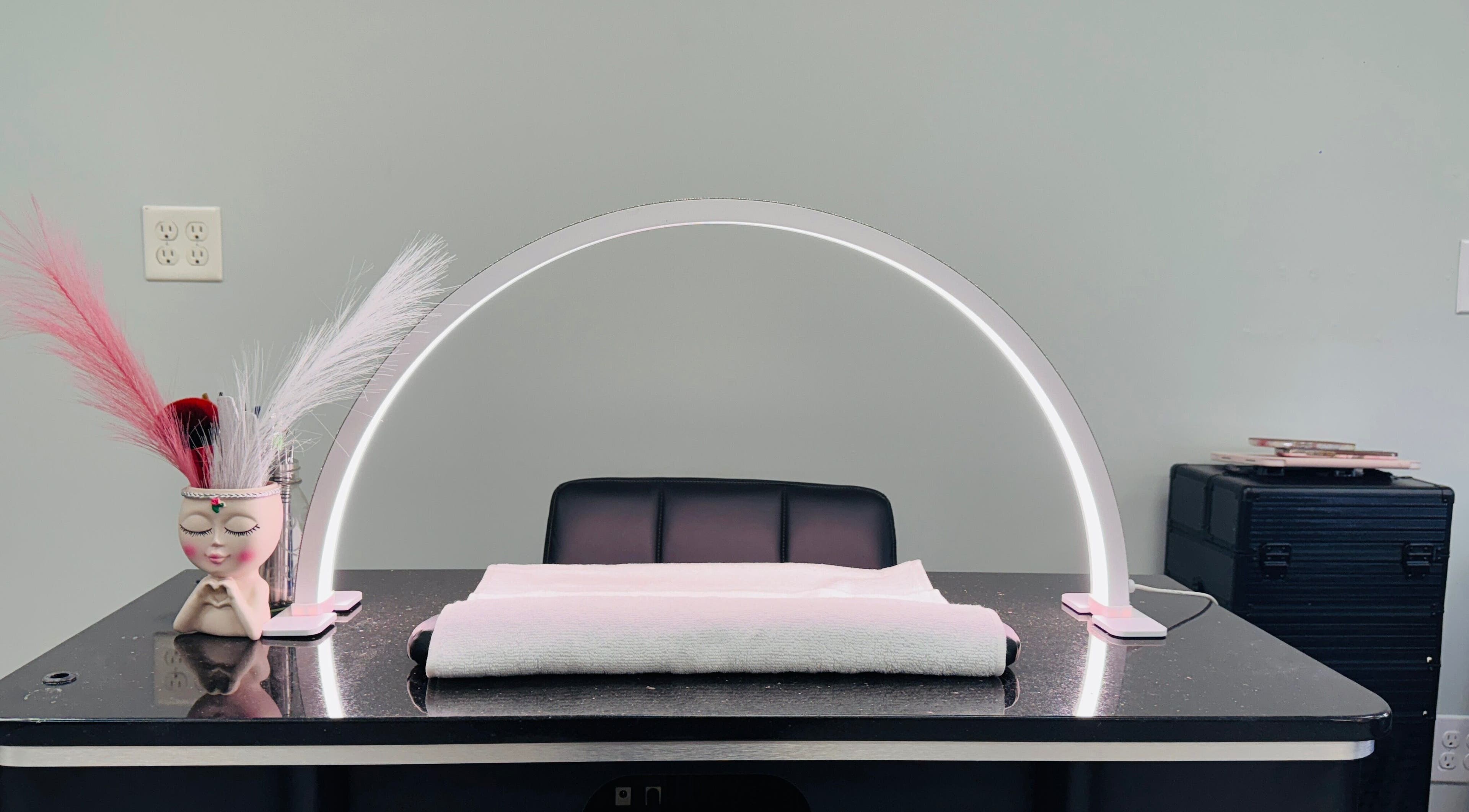 Nailstalgic✨ nail station in Lubbock, Texas, US, showcasing elegant decor and modern lighting.