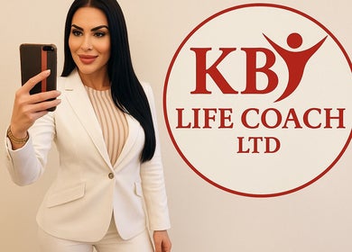 Professional woman taking a selfie at KB Life Coach Ltd, London, England, GB.