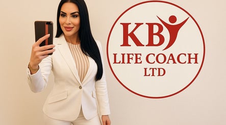 Professional woman taking a selfie at KB Life Coach Ltd, London, England, GB.