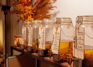 Jars of herbal infusions at Caballe.M Spa, Singapore, SG, highlighting natural wellness treatments.