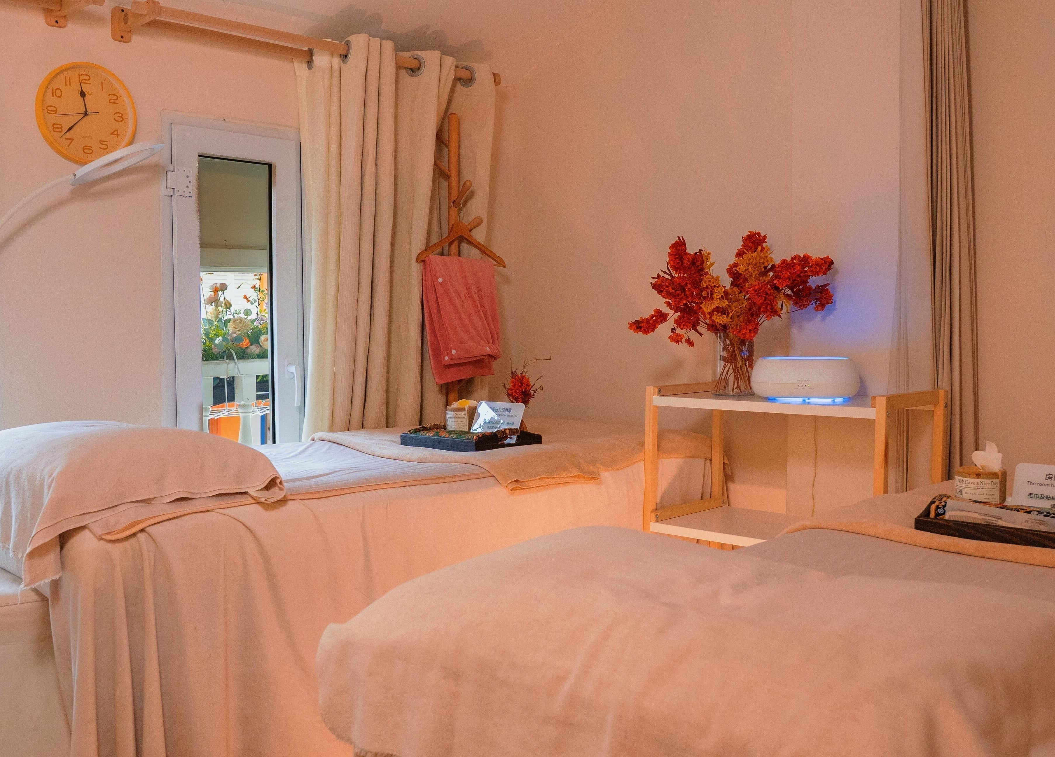 Relaxing massage room at Caballe.M Organic Skin Spa - Toa Payoh in Singapore, Singapore, SG with calming decor.