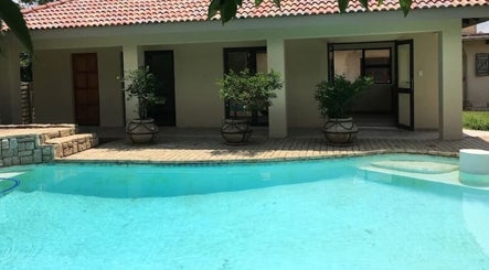 Relaxing pool area at Tvisha Aesthetics in Alberton, Gauteng, ZA, perfect for wellness and rejuvenation.