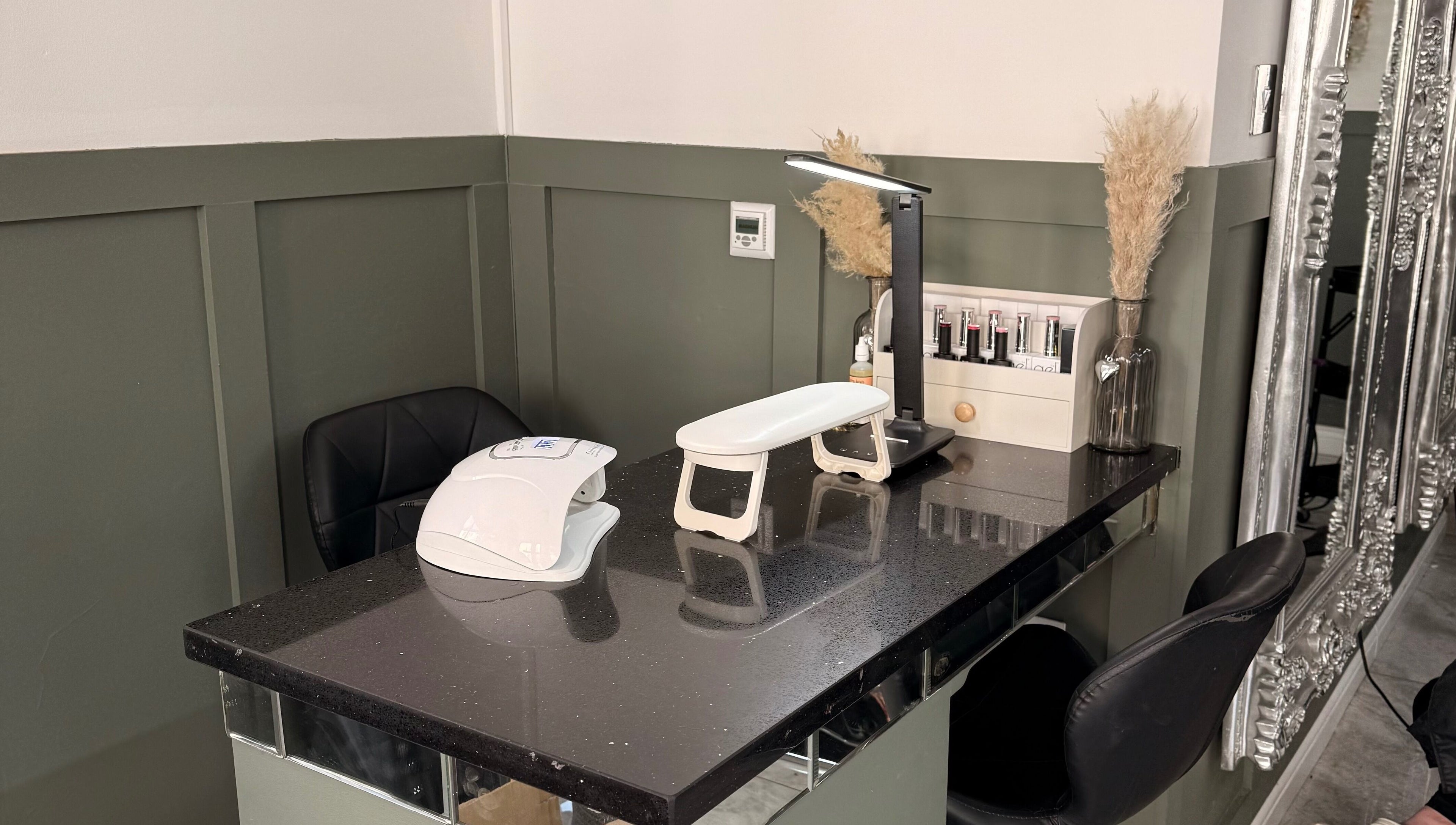 Elegant nail station at Nails by em 🪽✨ in Hartlepool, England, GB. Featuring modern decor and tools.