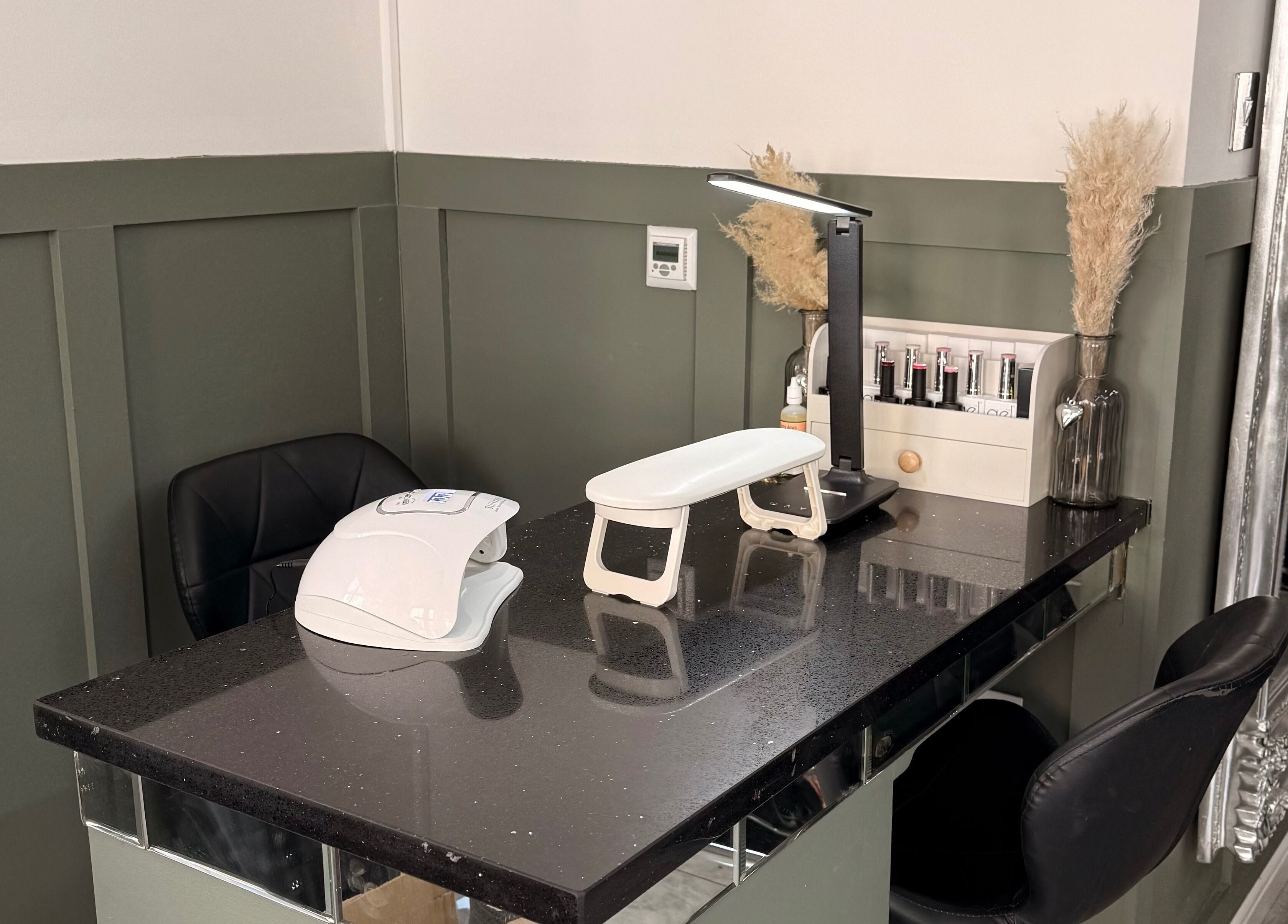 Elegant nail station at Nails by em 🪽✨ in Hartlepool, England, GB. Featuring modern decor and tools.