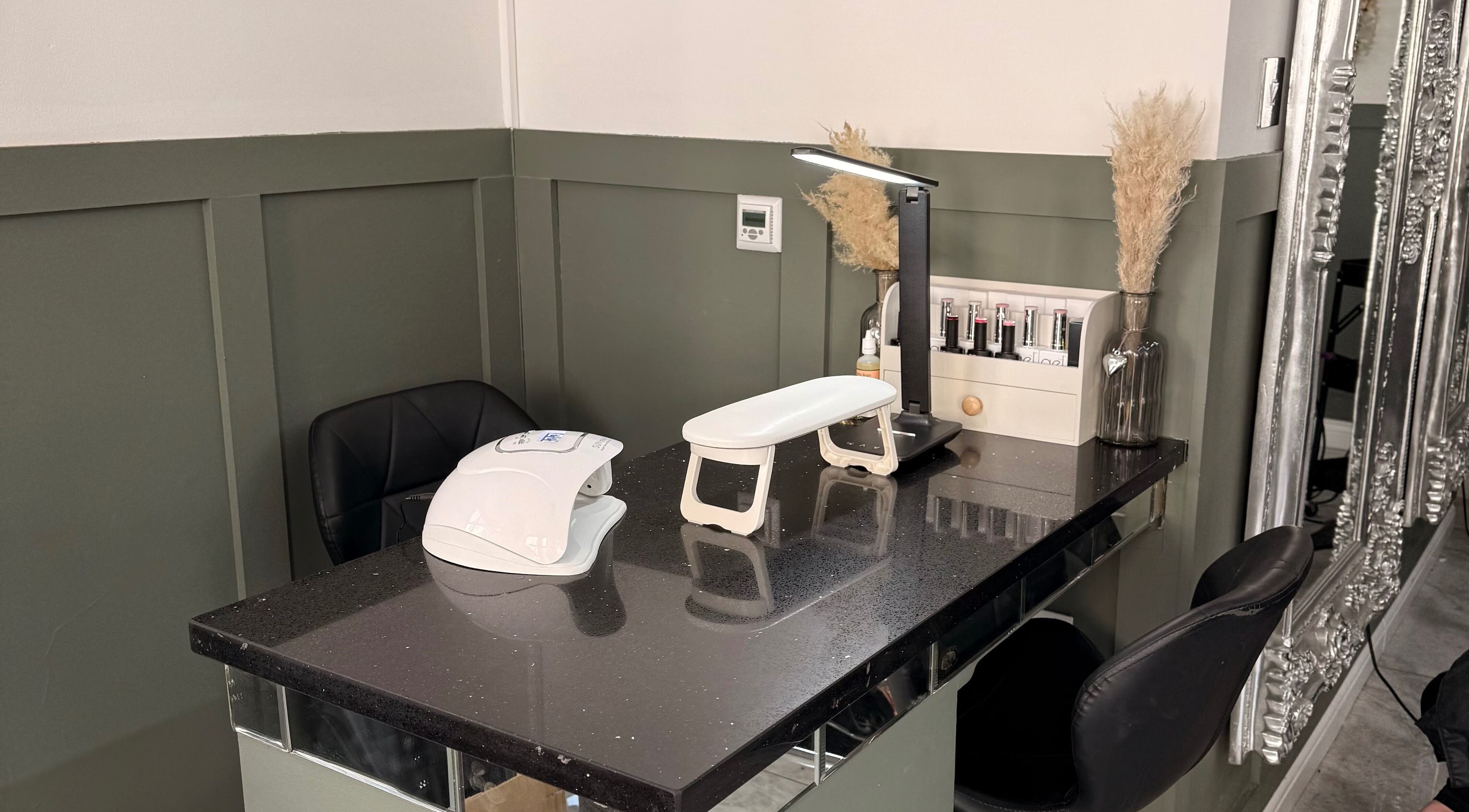 Elegant nail station at Nails by em 🪽✨ in Hartlepool, England, GB. Featuring modern decor and tools.