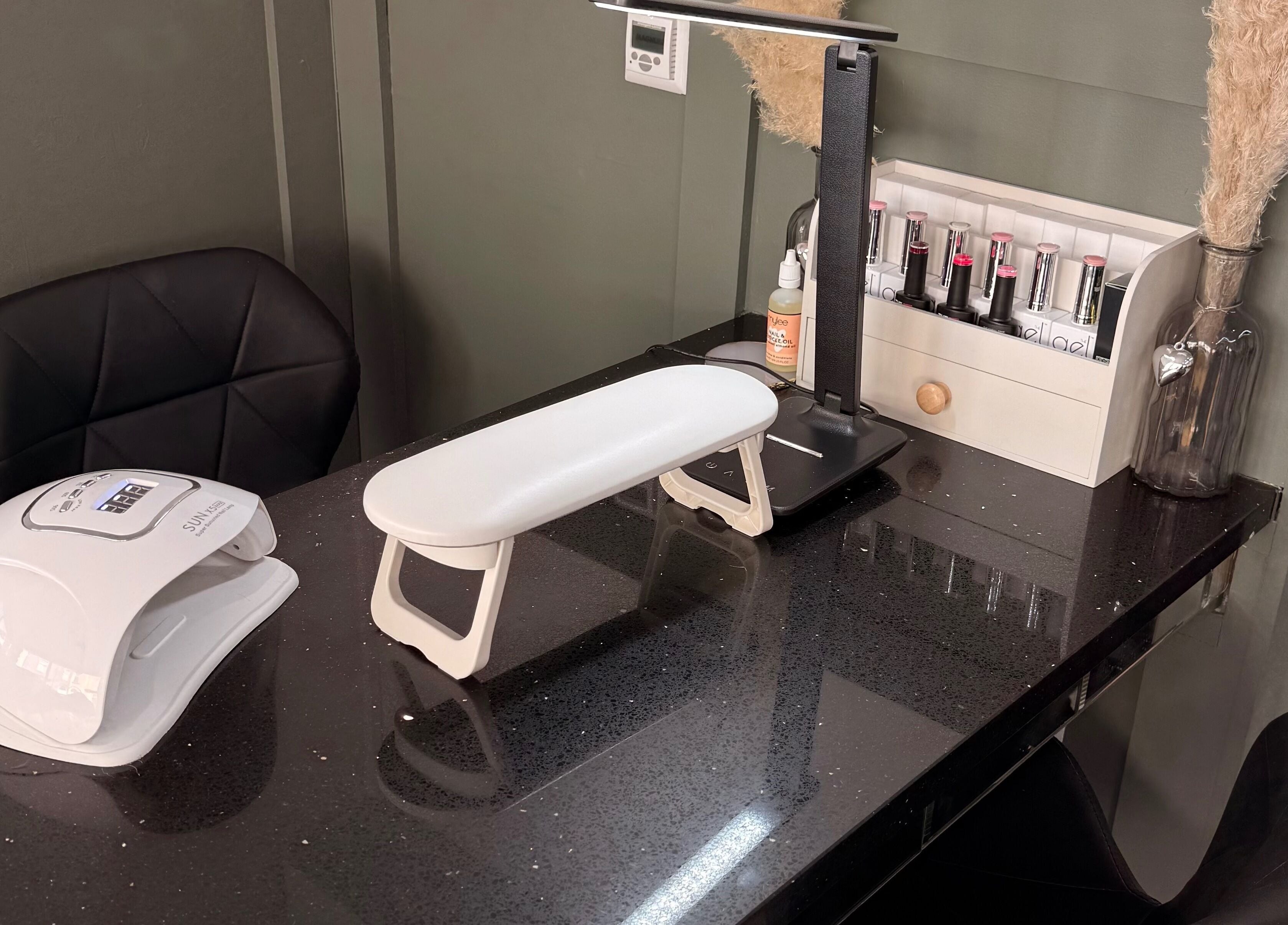 Elegant nail station at Nails by em 🪽✨ in Hartlepool, England, GB, featuring polish and equipment.