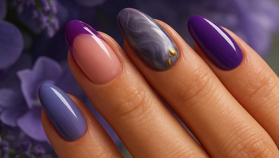Elegant nail art at Bren_Nails, East Riverdale, Maryland, US, featuring purple and pink hues.