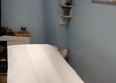 Serene massage room at The Massage Therapy Centre, Wembley, England, GB, offering a peaceful atmosphere.