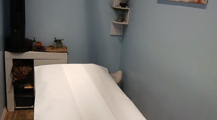 Serene massage room at The Massage Therapy Centre, Wembley, England, GB, offering a peaceful atmosphere.