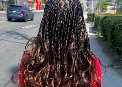 Intricate braids styled at Fav_Ottawa_braider in Ottawa, Ontario, CA street view.
