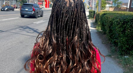 Intricate braids styled at Fav_Ottawa_braider in Ottawa, Ontario, CA street view.