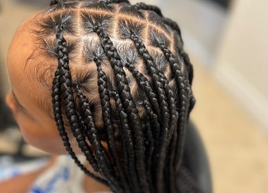 Intricate braids styled at Fav_Ottawa_braider in Ottawa, Ontario, CA. Perfect craftsmanship and style.