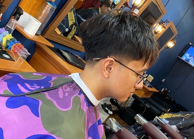 Client receiving a stylish haircut at Blvckshears Home Service Barber in Marikina, Metro Manila, PH.