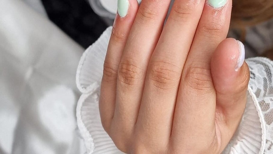 Stylish mint manicure at BeYouBeauty in Larne, Northern Ireland, GB. Perfect for a fresh, elegant look.