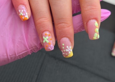 Colorful floral nail art design at BeYouBeauty, Larne, Northern Ireland, GB.
