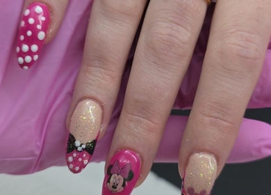 Fun pink manicured nails with designs at BeYouBeauty, Larne, Northern Ireland, GB.