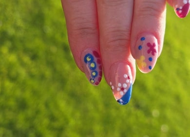 Colorful nail art at BeYouBeauty, Larne, Northern Ireland, GB, showcasing detailed and playful designs.