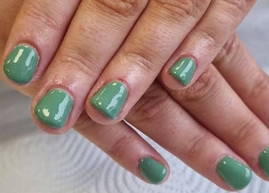 Emerald green manicure at BeYouBeauty, Larne, Northern Ireland, GB. Perfect for a chic, modern look.