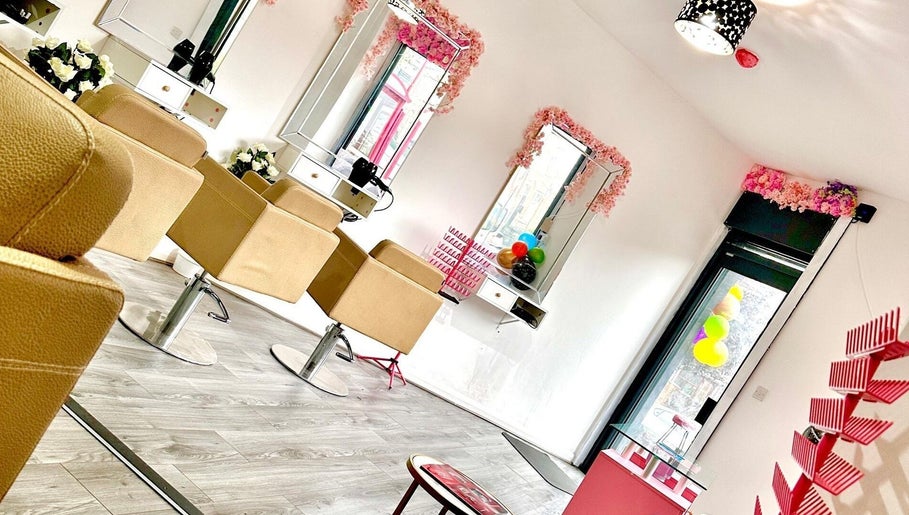 Stylish salon interior at Teemasbeautyplaceltd, Bradford, England, GB with plush chairs and elegant decor.