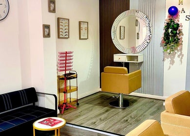 Modern salon seating at Teemasbeautyplaceltd, Bradford, England, GB. Elegant design with comfy chairs and stylish décor.