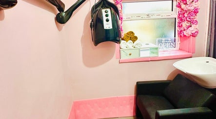 Modern salon corner at Teemasbeautyplaceltd, Bradford, England, GB with stylish decor and hair washing station.