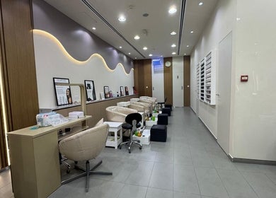 Layali Al Zahra Beauty Salon interior featuring luxury nail stations in Dubai, AE.