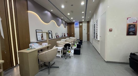 Layali Al Zahra Beauty Salon interior featuring luxury nail stations in Dubai, AE.
