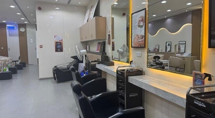 Modern salon chairs and mirrors at Layali Al Zahra Beauty Salon in Dubai, AE, showcasing a stylish ambiance.