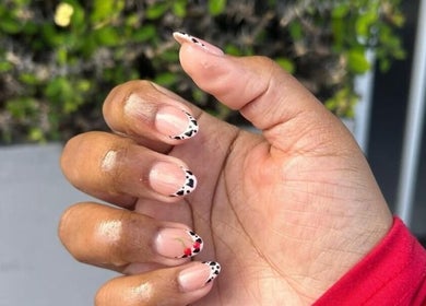 Stylish nail art with black and red accents at Luxe Beau, Cape Town, Western Cape, ZA.