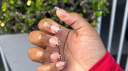 Stylish nail art with black and red accents at Luxe Beau, Cape Town, Western Cape, ZA.